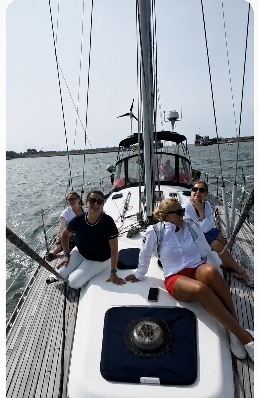 Guests relaxing on the deck of Pérola while under sail